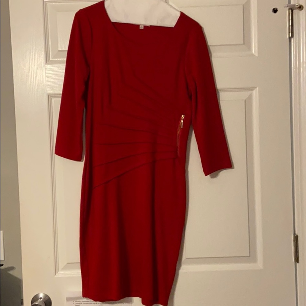 Cute red dress. Three-quarter length sleeves